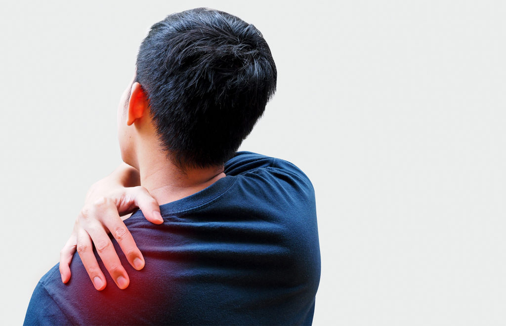 a man suffering from shoulder pain