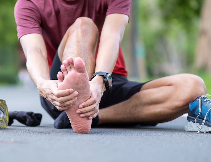 a man suffering from plantar fasciitis